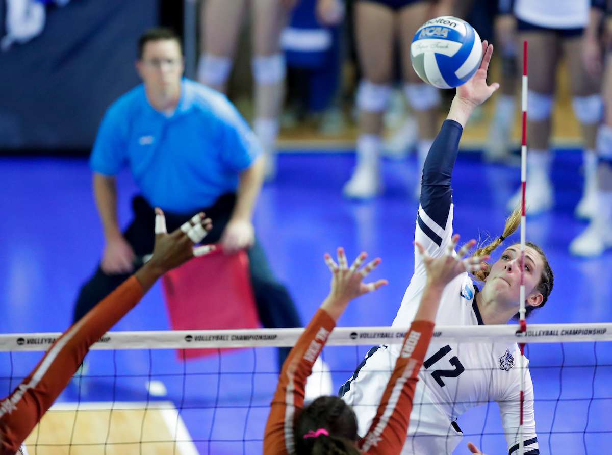 Roni Jones-Perry scores a kill against Texas in the first set during BYU women's volleyball team's sweep of No. 5 Texas regional final of the NCAA Women's Volleyball Championships. (Photo: Jaren Wilkey, BYU Photo)
