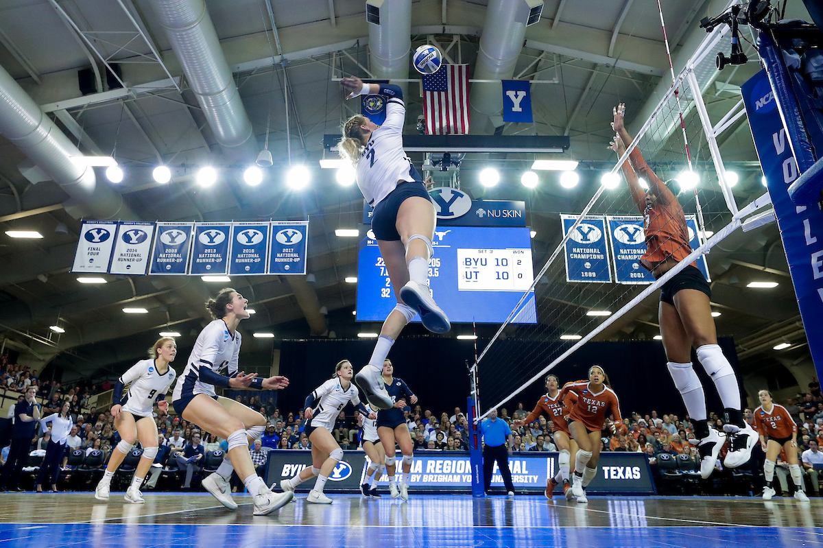 BYU's Heather Gneiting spikes the ball against Texas during an NCAA women's volleyball match, Saturday, Dec. 8, 2018 in Provo. (Photo: Jaren Wilkey, BYU Photo)