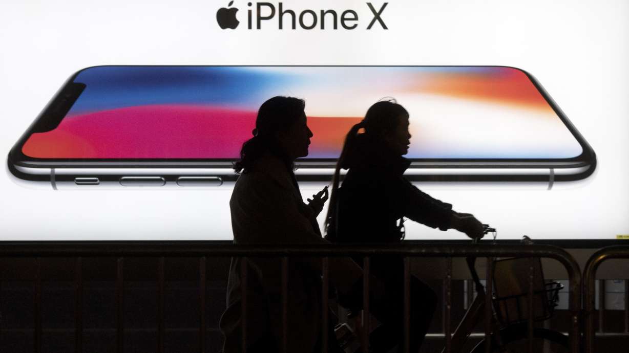 The Latest: Apple to appeal iPhone ruling in China