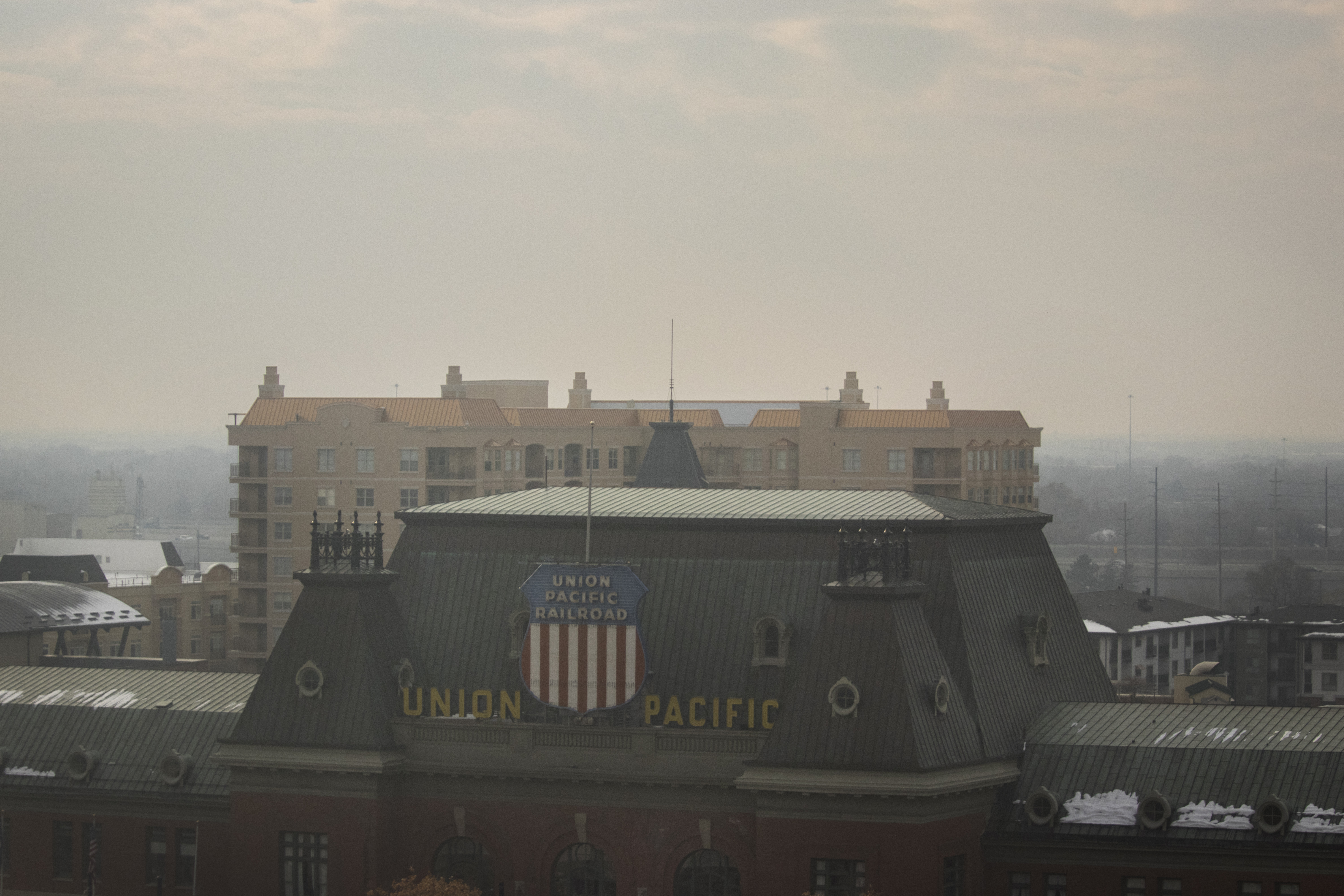 An image from the KSL Building taken Saturday, Dec. 8, 2018. The Oqurrih Mountains are no longer visible beyond the Union Pacific Depot. (Photo: Carter Williams, KSL.com)
