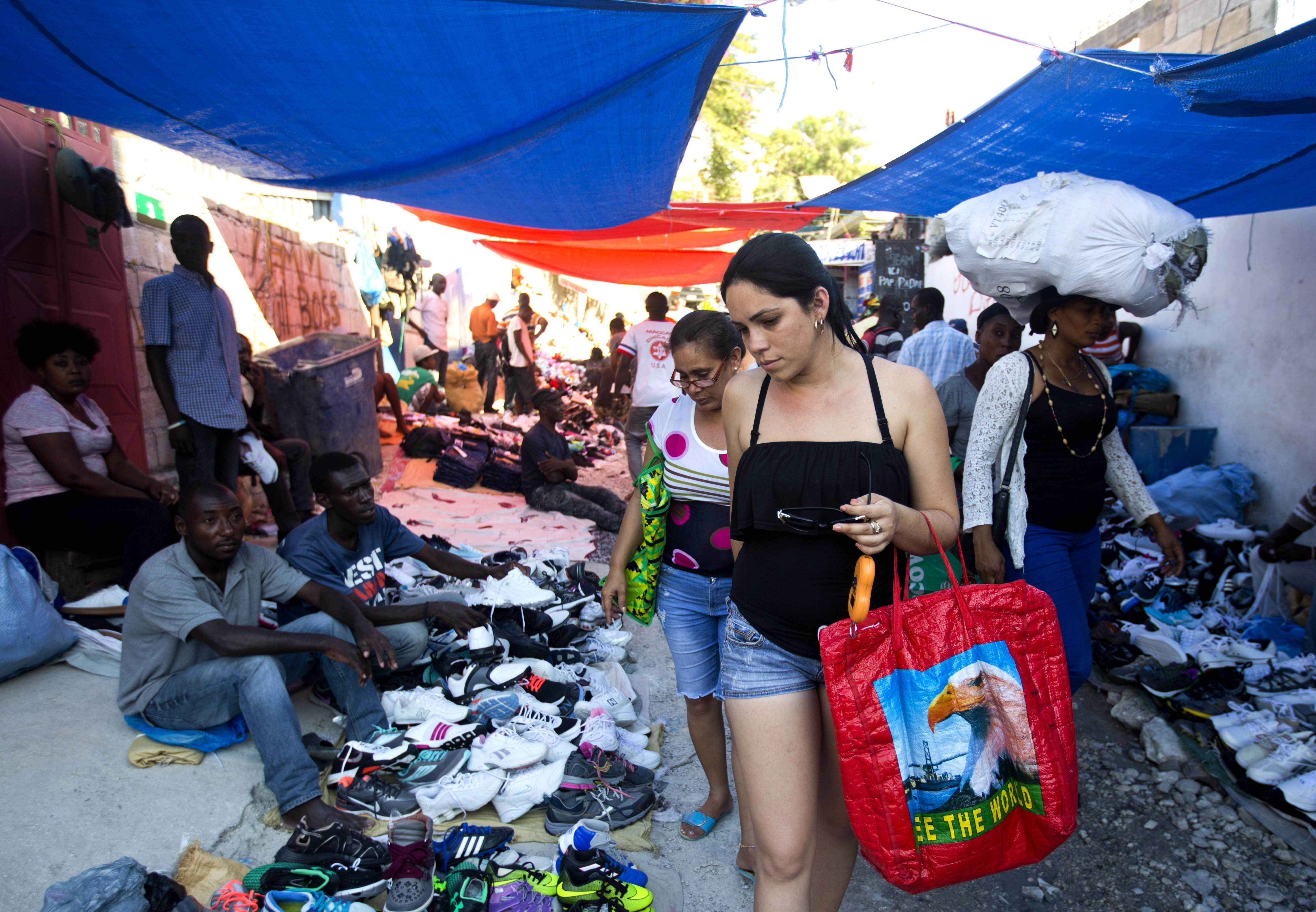 Cubans fly around the world hunting shopping bargains