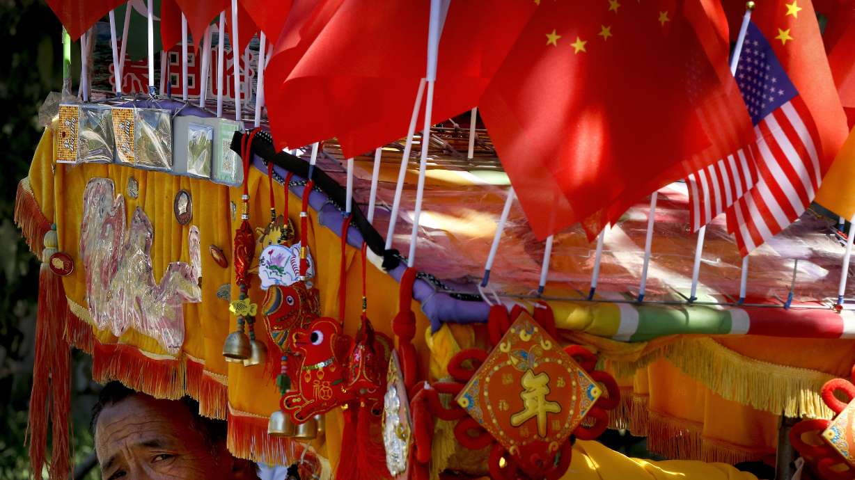 The Latest: Trump " says developments in US-China trade
