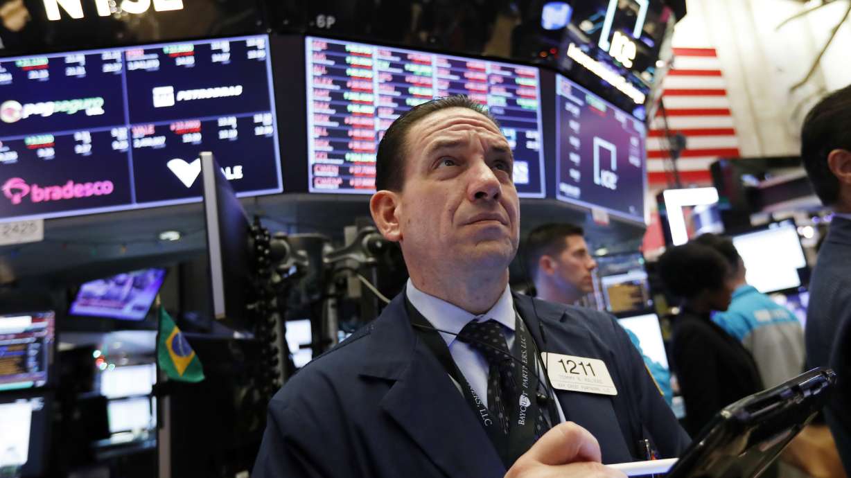 Markets Right Now: Stock market ends mixed after a bumpy day