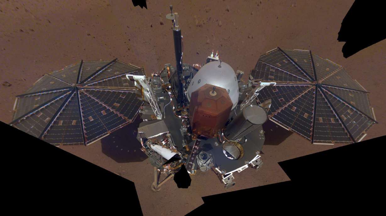 NASA's Mars lander takes selfie from above with robotic arm