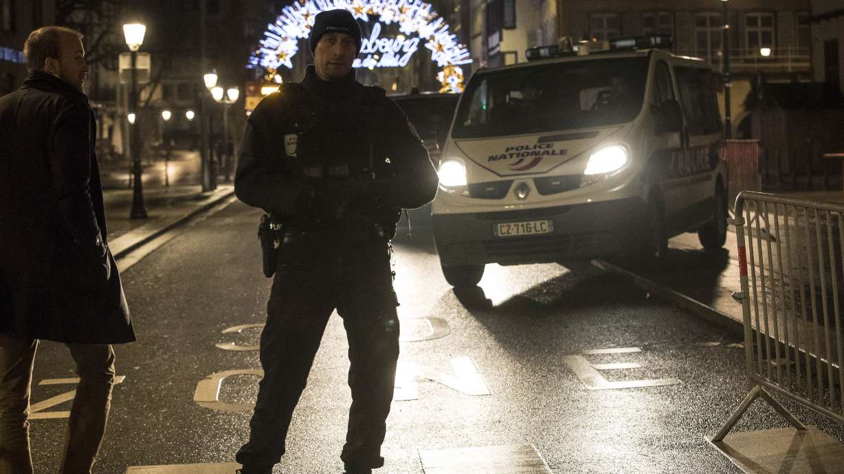 The Latest: France issues wanted poster for shooting suspect