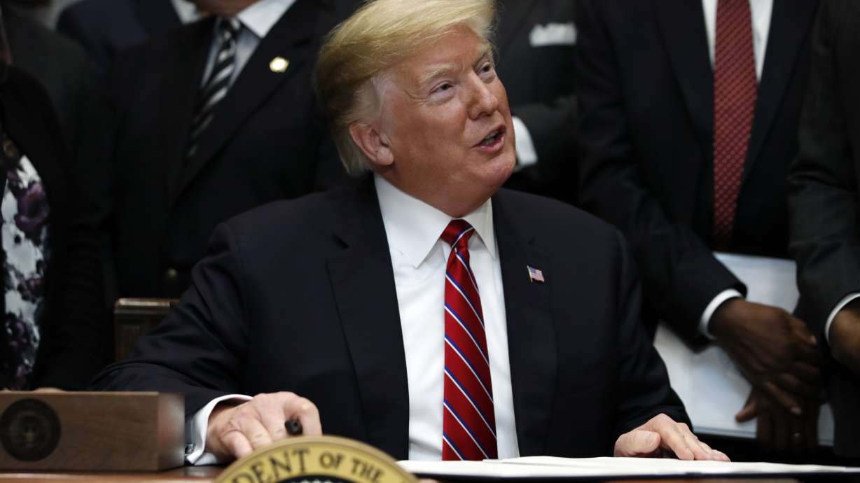 The Latest: Trump order boosts Opportunity Zones program