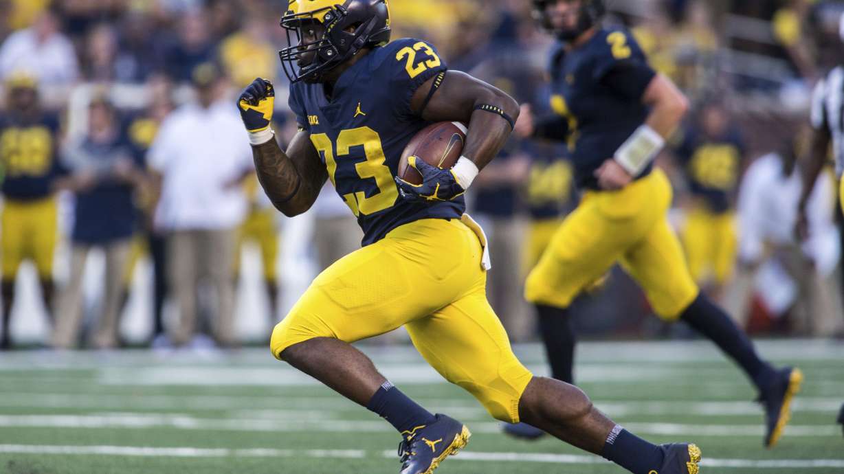 Michigan dismisses RB Samuels after domestic violence charge