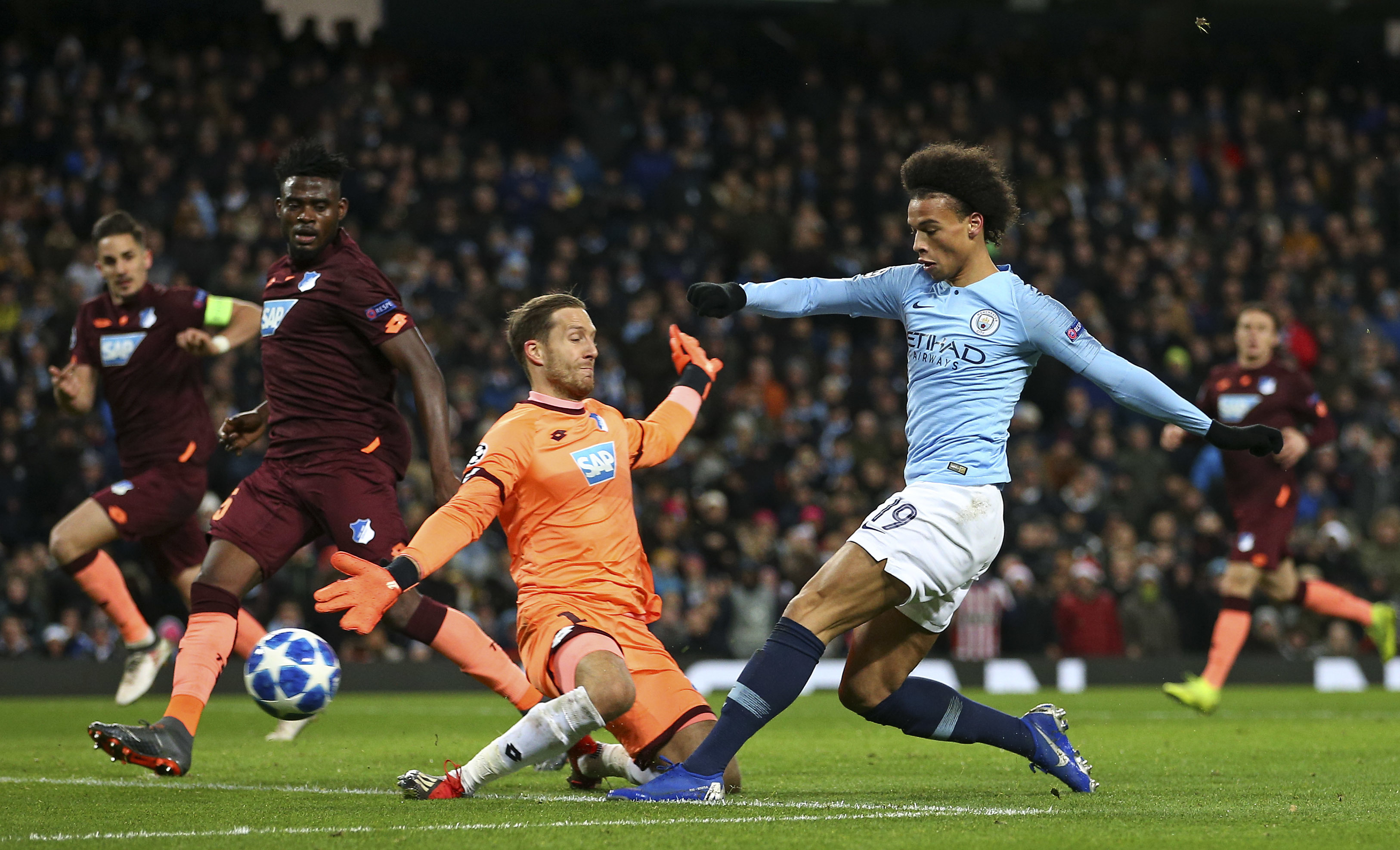Sane double earns Man City 2-1 win, top spot in CL group