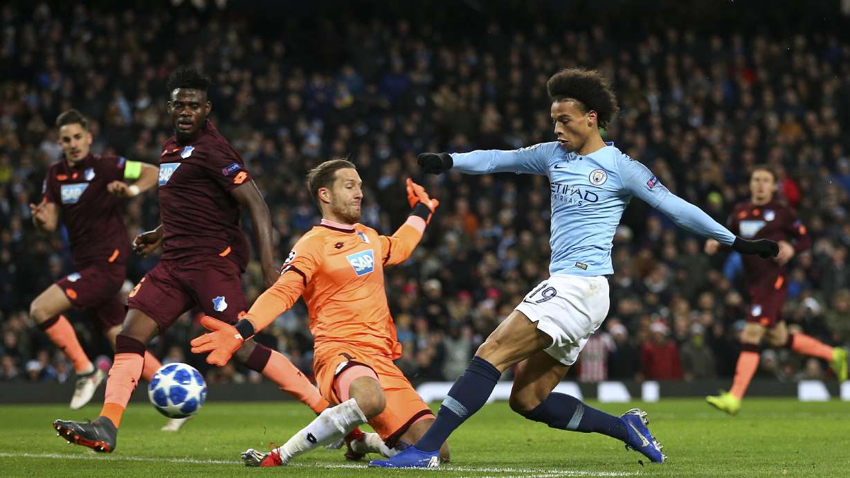 Sane double earns Man City 2-1 win, top spot in CL group