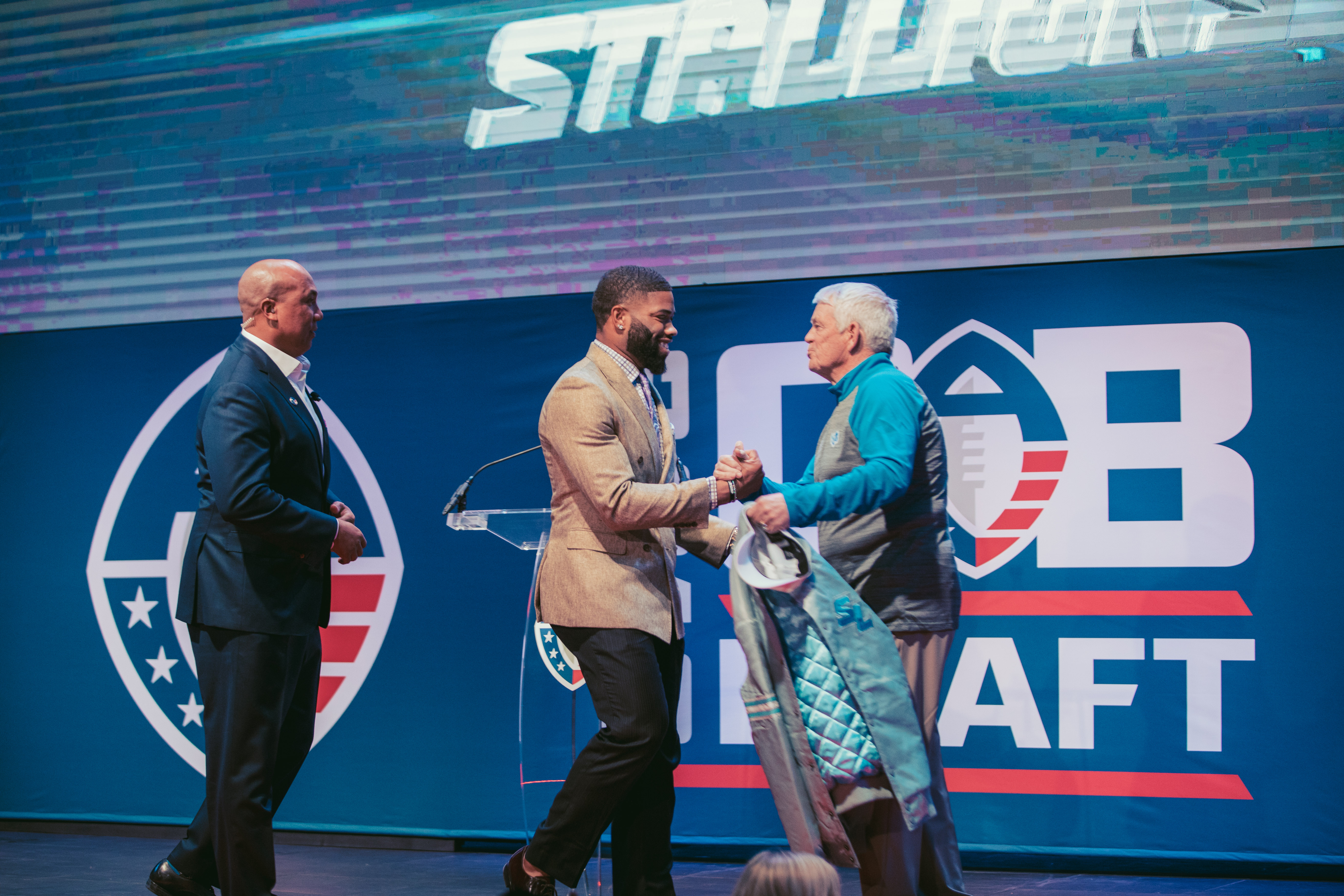 Former USF and Seattle Seahawks quarterback B.J. Daniels meets Salt Lake Stallions head coach Dennis Erickson during the inaugural QB Draft of the Alliance of American Football in Las Vegas. (Courtesy photo: Salt Lake Stallions)