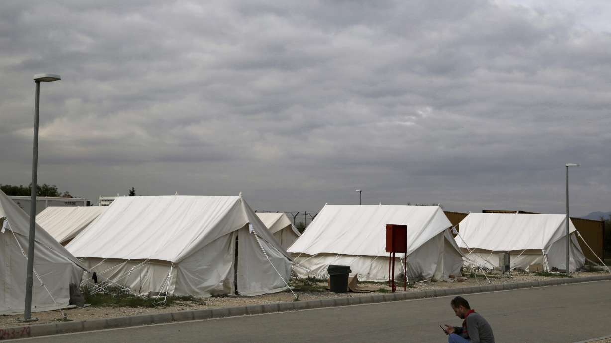 The Latest: Car carrying migrants has fatal crash in Greece