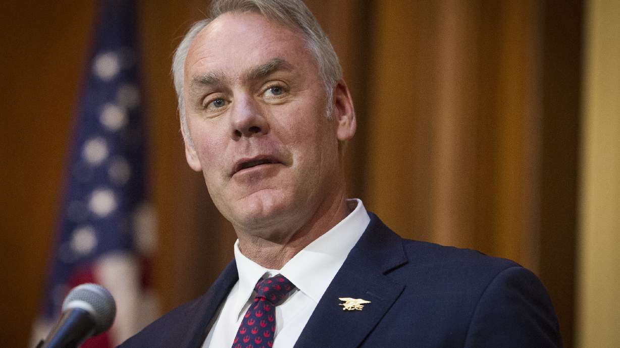 The Latest: Zinke says 'attacks' led to his resignation