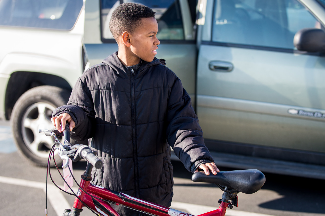 Kingston Taban, 10, receives a bike from Free Bikes 4 Kidz at Nate Wade Subaru in Salt Lake City on Saturday, Dec. 15, 2018. (Photo: Qiling Wang, KSL)