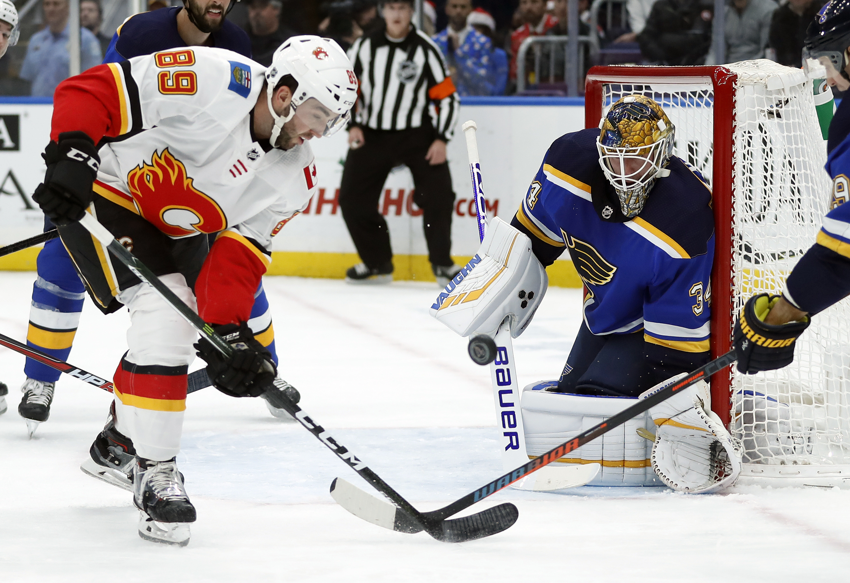 Tkachuk gets 1st goal in hometown, leads Flames over Blues
