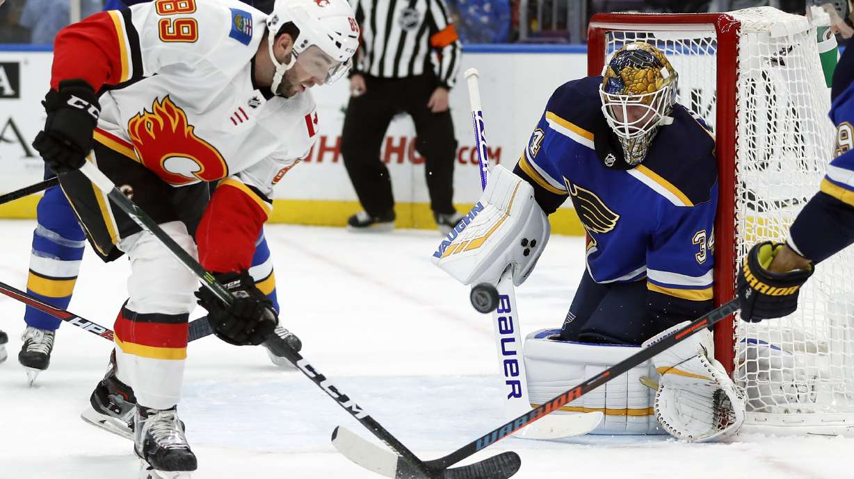 Tkachuk gets 1st goal in hometown, leads Flames over Blues