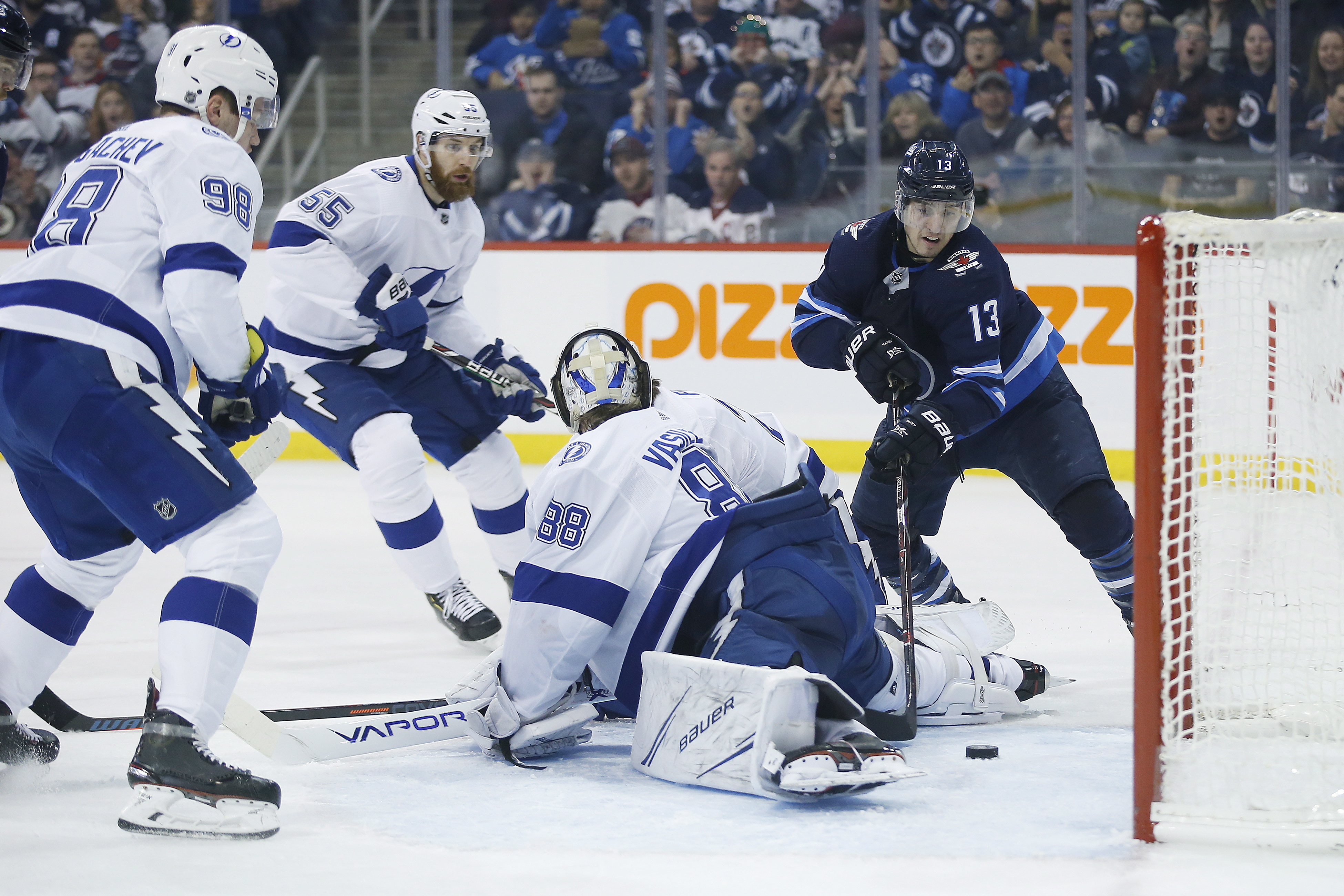 Scheifele scores in OT, sends Jets past Lightning 5-4