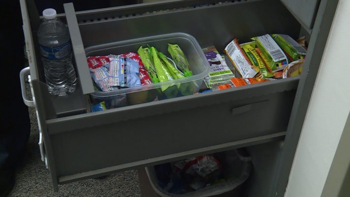 Krista Gibbons says about 30-40 students take food from this cabinet every day. Photo: Ray Boone, KSL TV