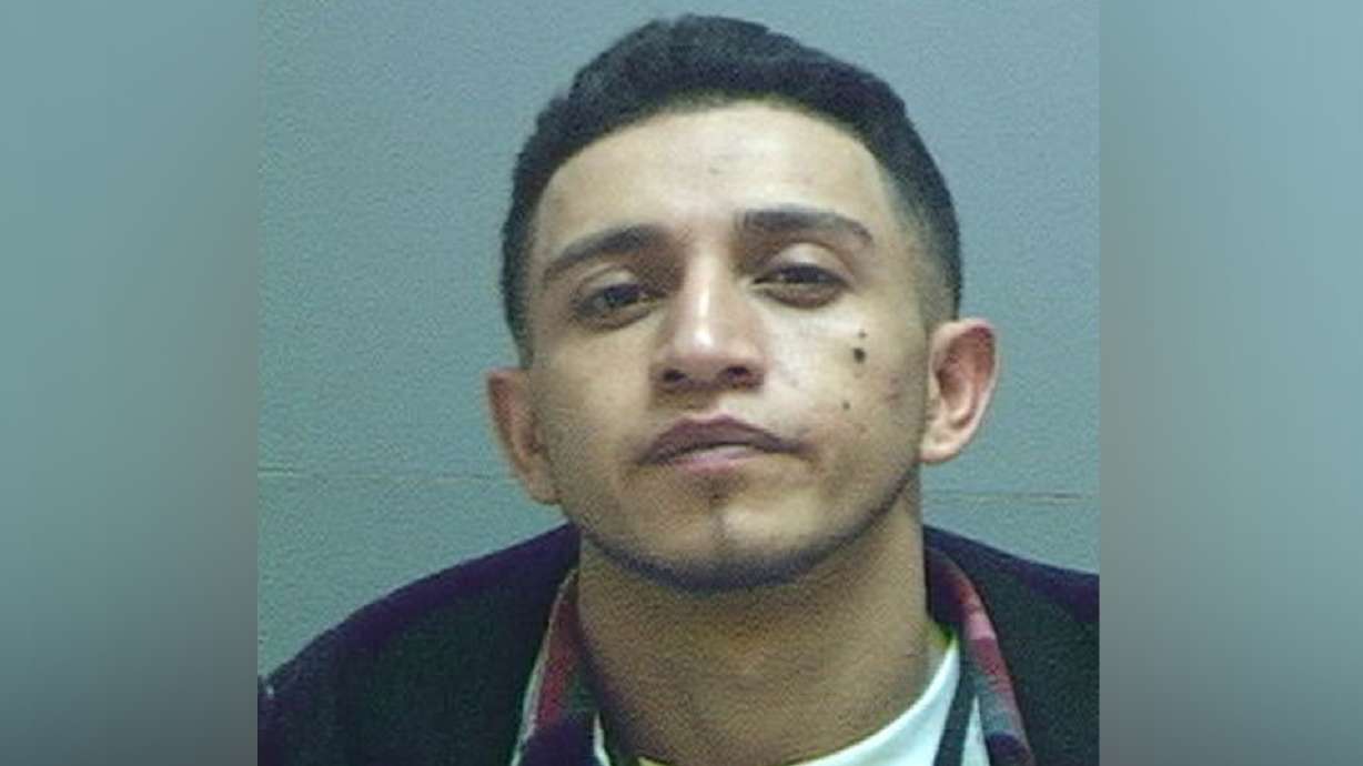 Man started fire in home while officers were standing outside, police say