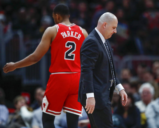 Chicago Bulls head coach Jim Boylen, right, walks past forward Jabari Parker, left, during a time out during the second half of an NBA basketball game against the Boston Celtics, Saturday, Dec. 8, 2018, in Chicago. Photo: Kamil Krzaczynski, AP Photo