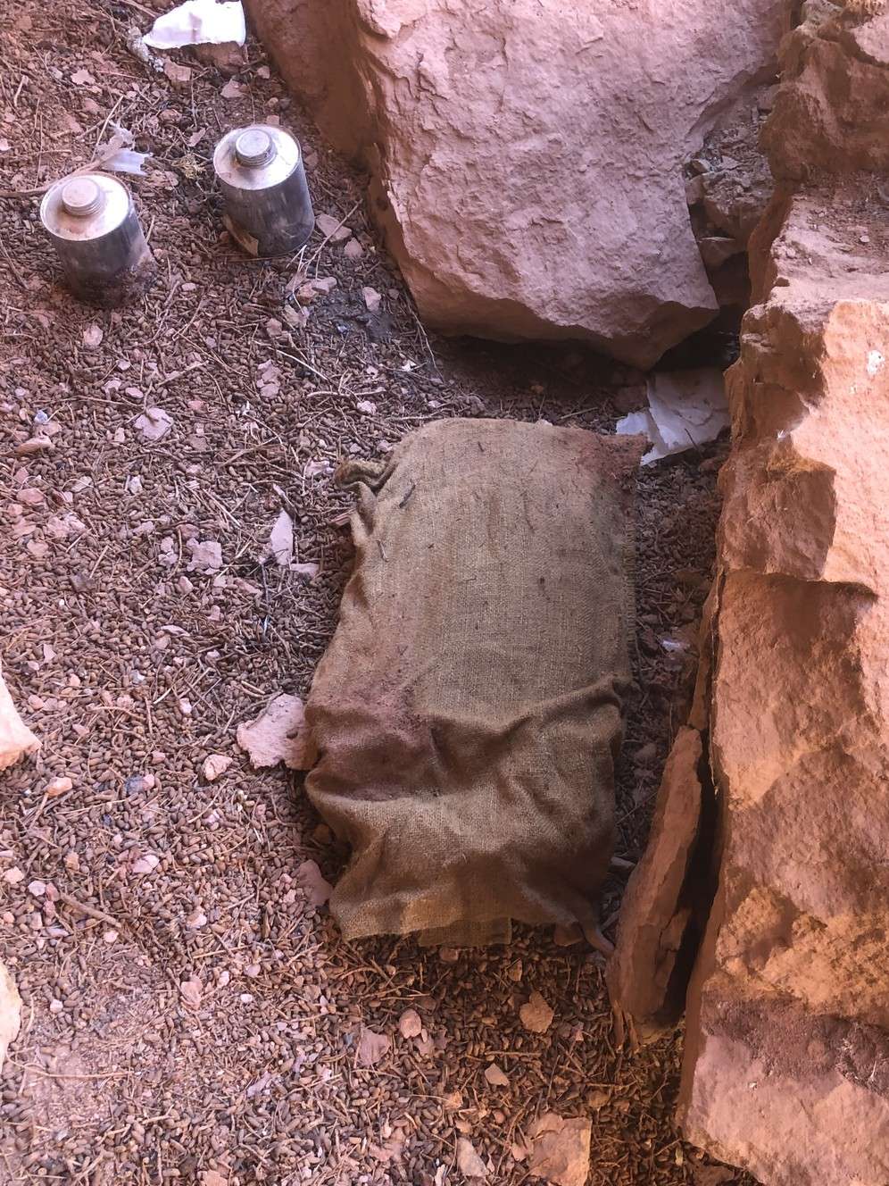 According to the Sevier County Sheriff's Office, two hikers found a cache of dynamite along with several pieces of clothing, tools, a gun, pots and pans, and some aspirin in an alcove under a cliff in Strawberry Canyon on Friday, Dec. 14, 2018. (Photo: Sevier County Sheriff's Office)