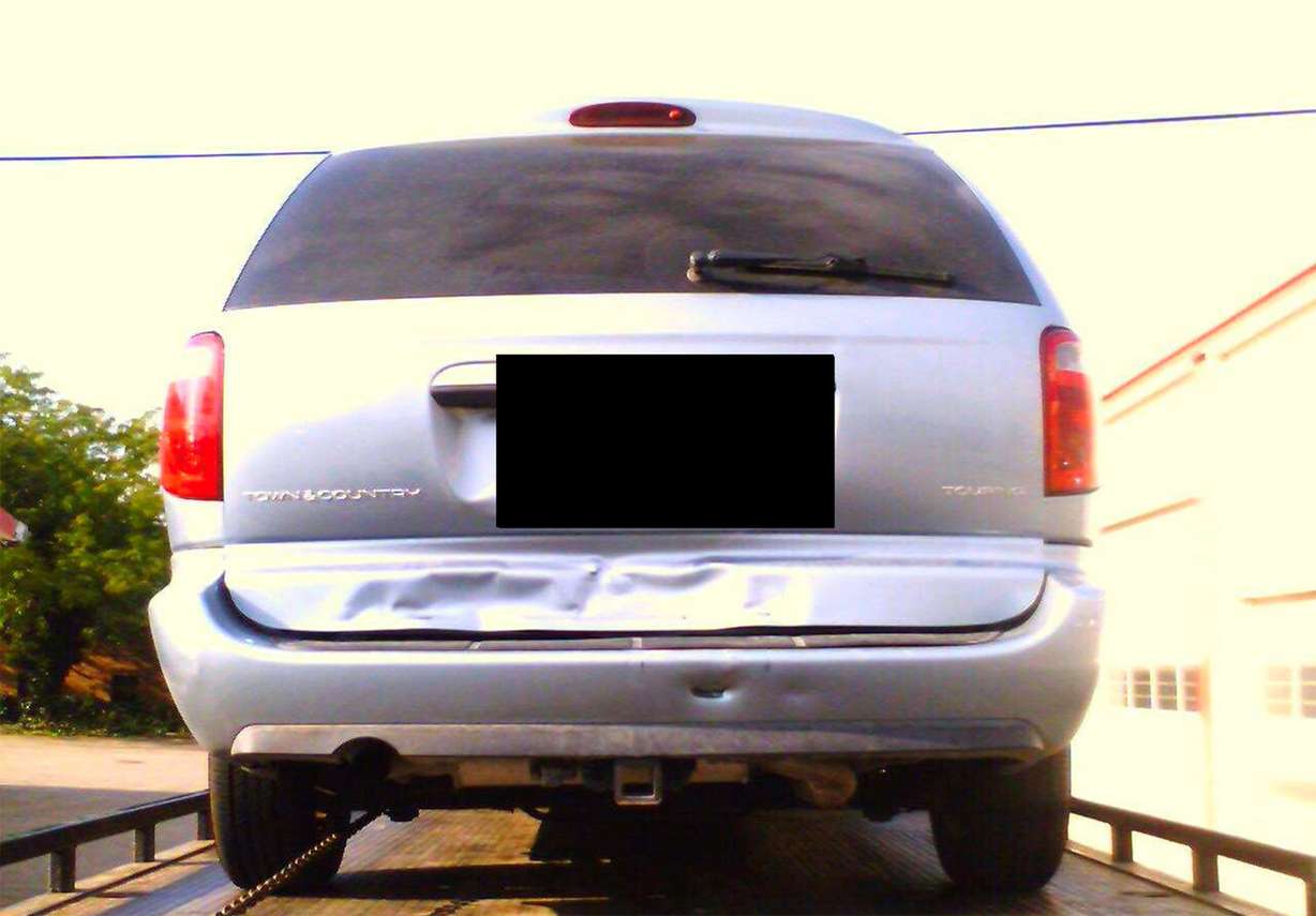 West Valley City police recovered this photo from Josh Powell's cellphone during the investigation into Susan Powell's disappearance. It showed minor damage to the Powell family's minivan following a rear-end crash on Sept. 2, 2009. (Photo: West Valley City, Utah police)
