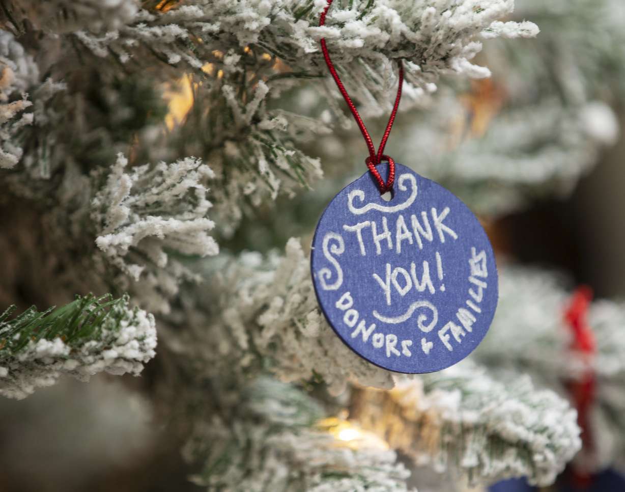 An ornament thanking donors and families hangs on a tree as Intermountain Donor Services honors donors and recipients at its Salt Lake City offices on Tuesday, Dec. 18, 2018. (Photo: Scott G Winterton, KSL)