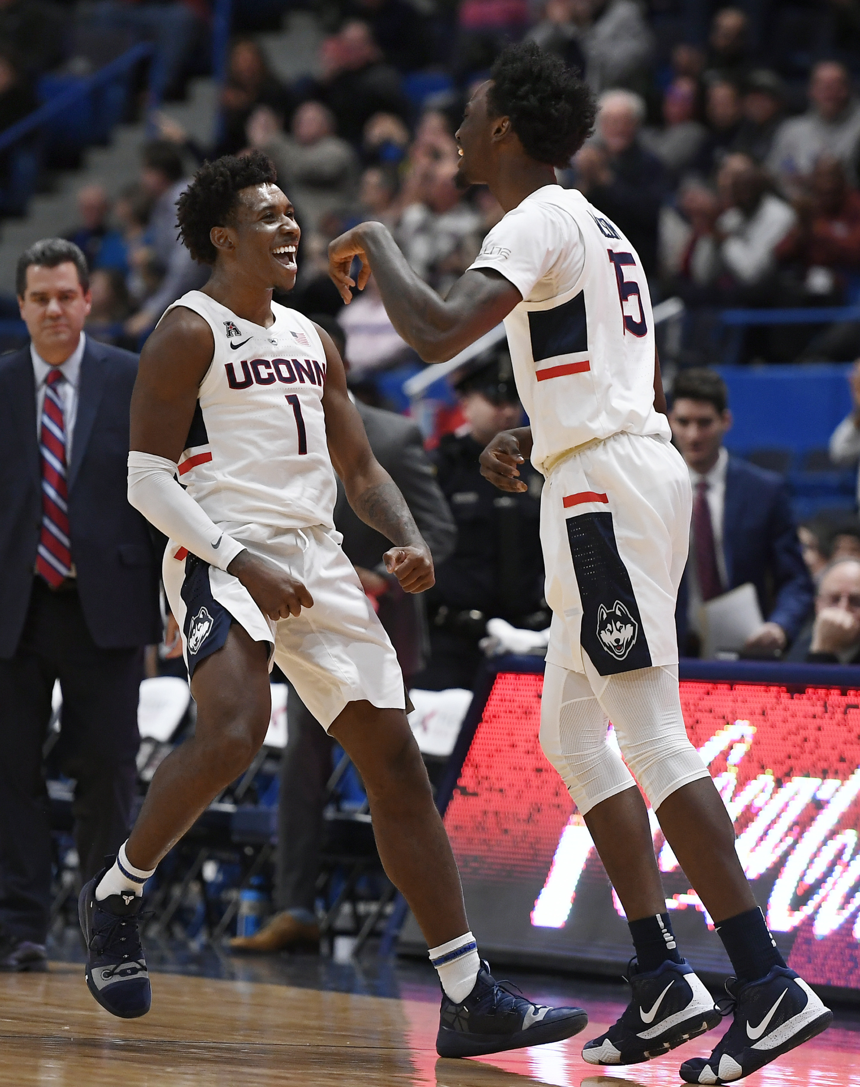 Adams, Smith lead UConn past Drexel 97-65