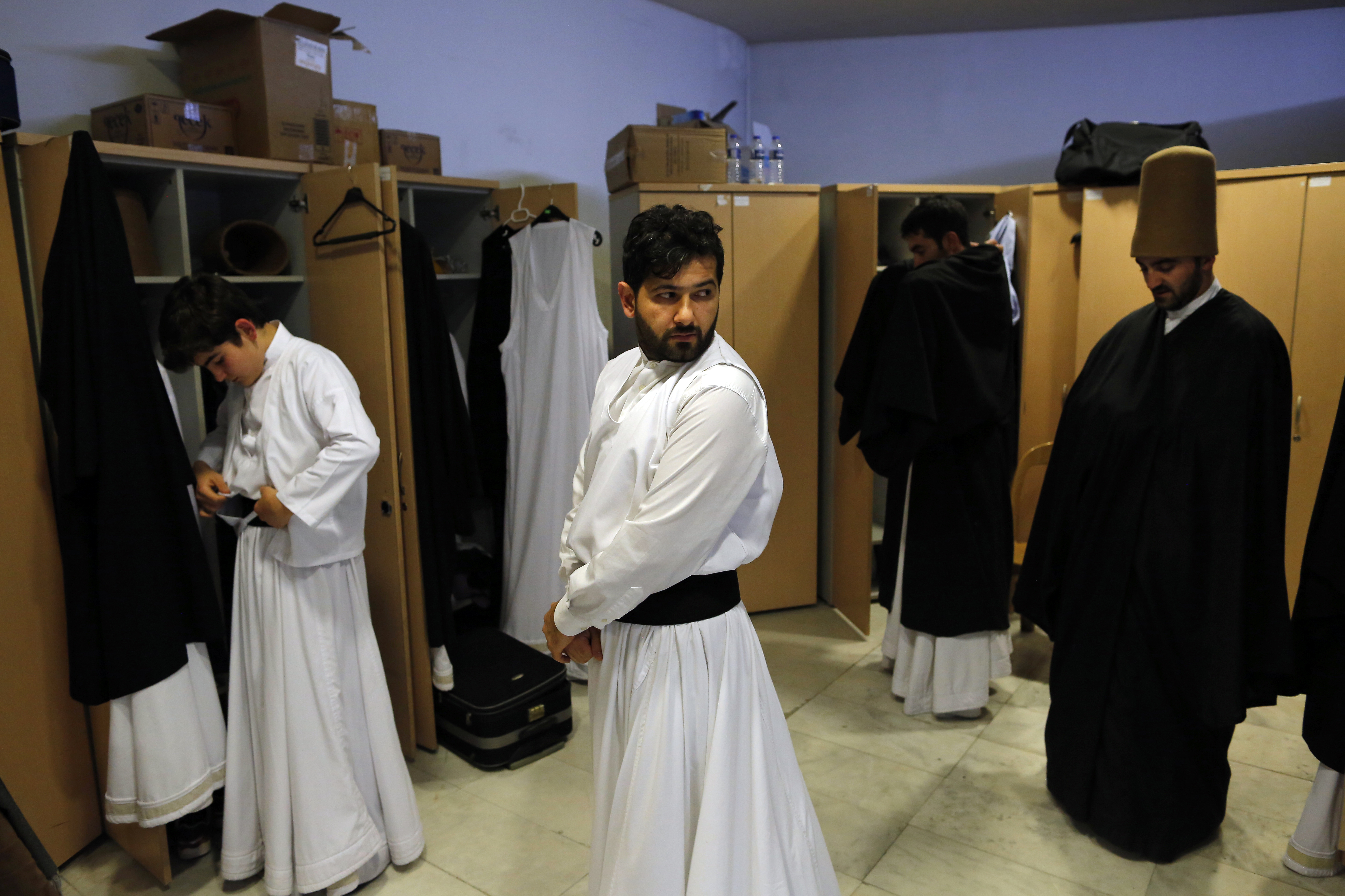 AP PHOTOS: Turkey's whirling dervishes honor Sufi poet