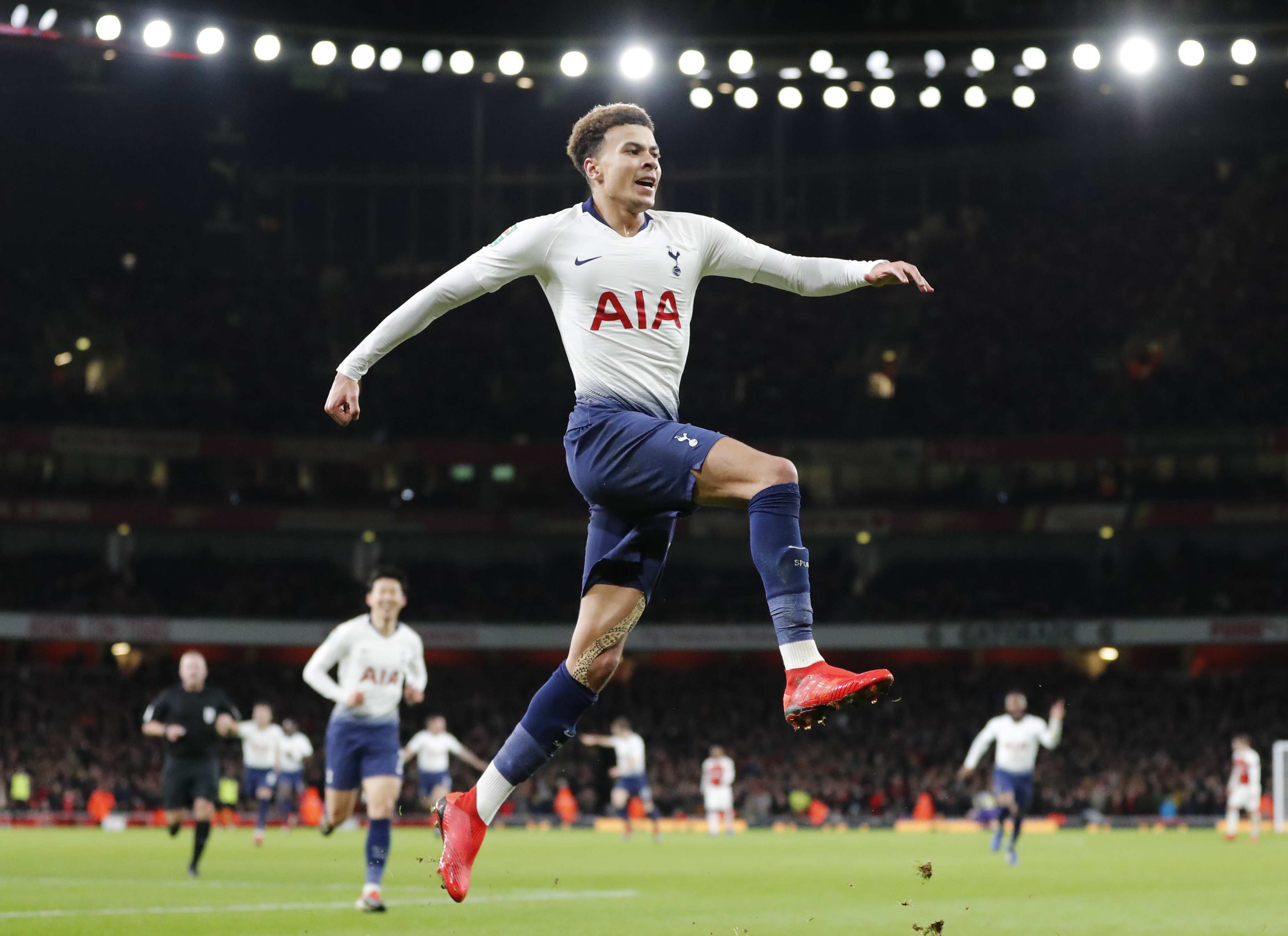 Tottenham's Dele Alli hit by bottle in derby win at Arsenal