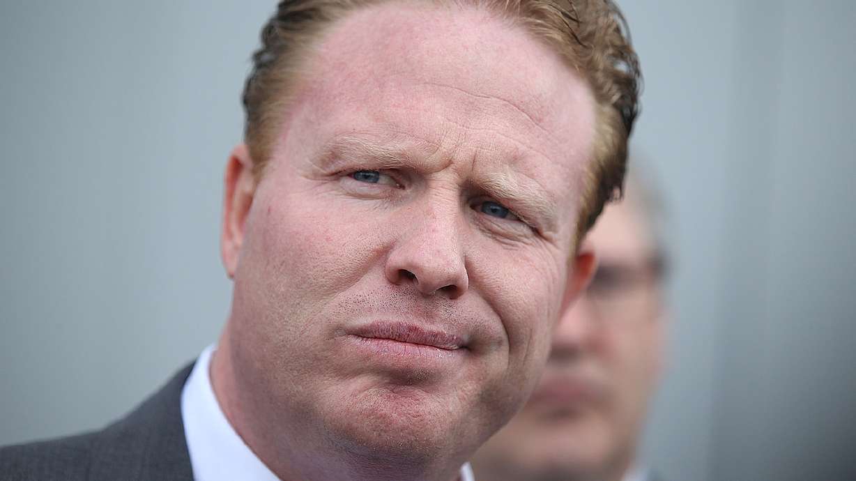 Judge reduces Jeremy Johnson's prison sentence after tearful apology