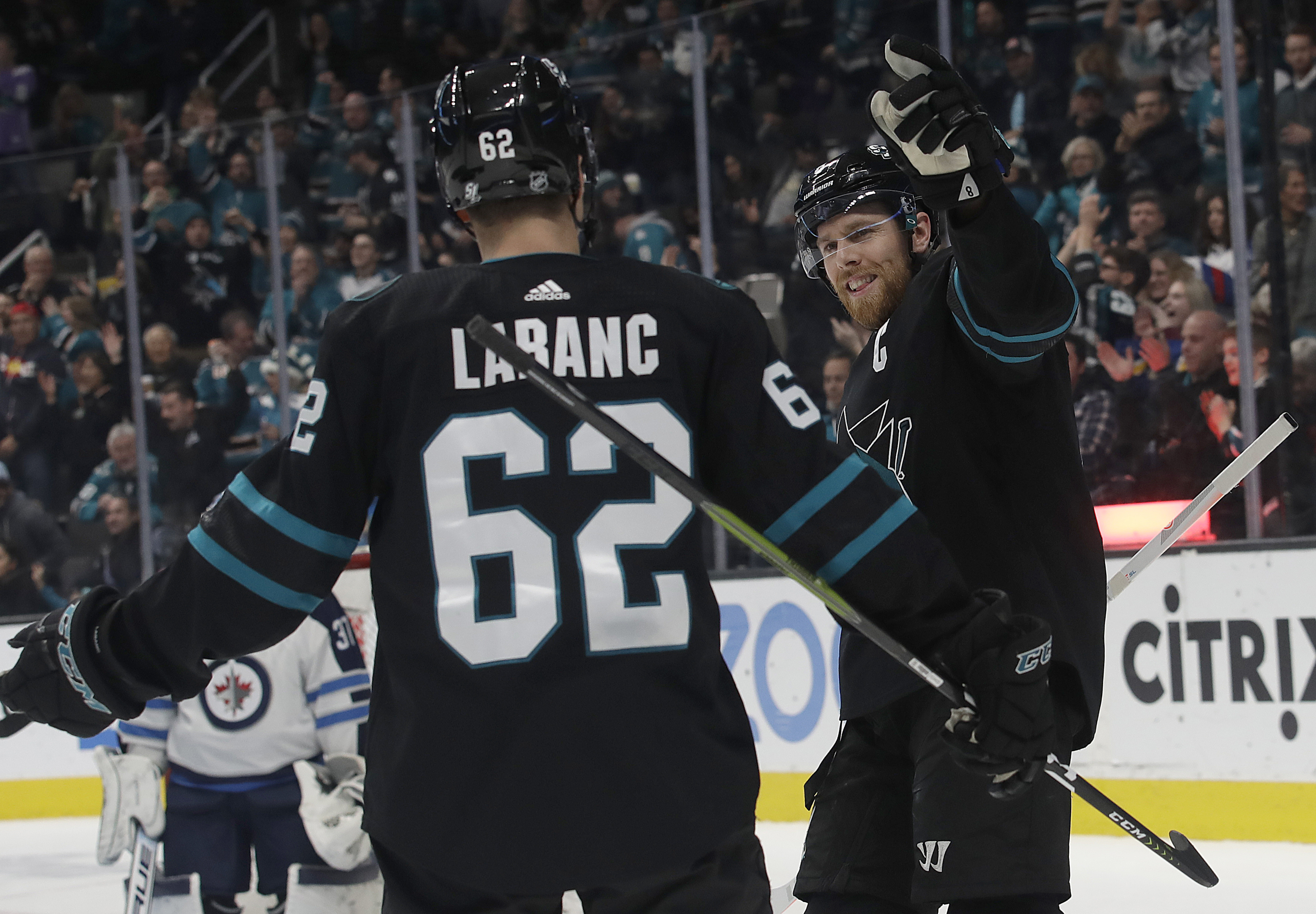 Ehlers scores hat trick to lead Jets past Sharks 5-3
