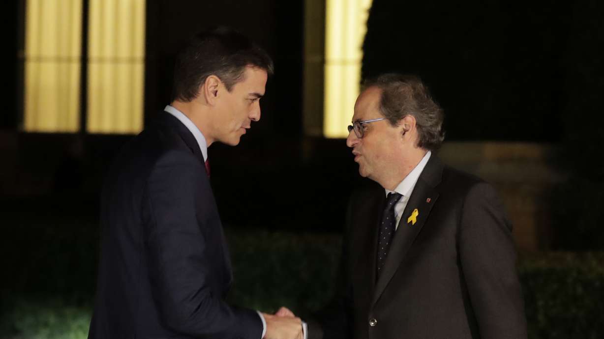 The Latest: Catalan separatists march in Barcelona