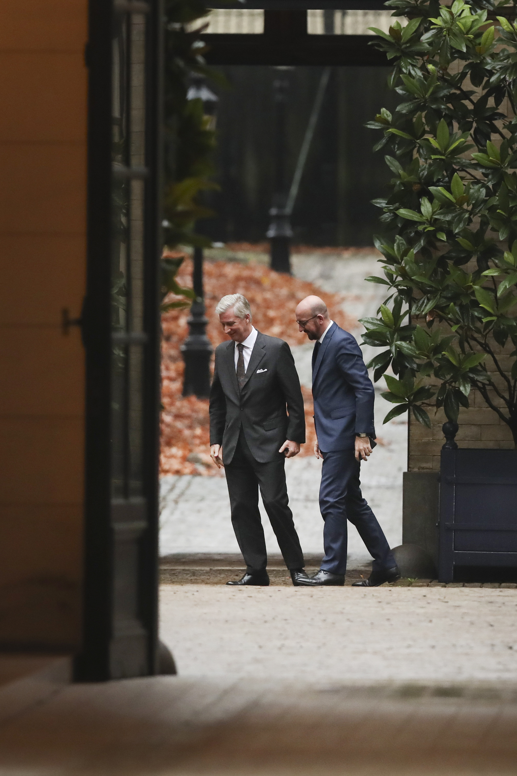 Belgian king asks premier to stay and lead caretaker Cabinet