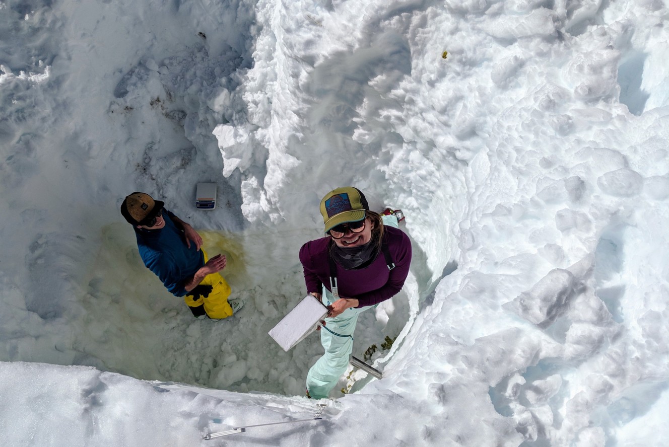An undated photo of McKenzie Skiles, an assistant professor at the U.’s department of geography (right), as she checks snow density at a testing location in Alta, Utah. Her study, released on Friday, Dec. 21, 2018, concluded dust particles accelerated snowmelt in Utah's mountains. (Photo: Courtesy McKenzie Skiles)