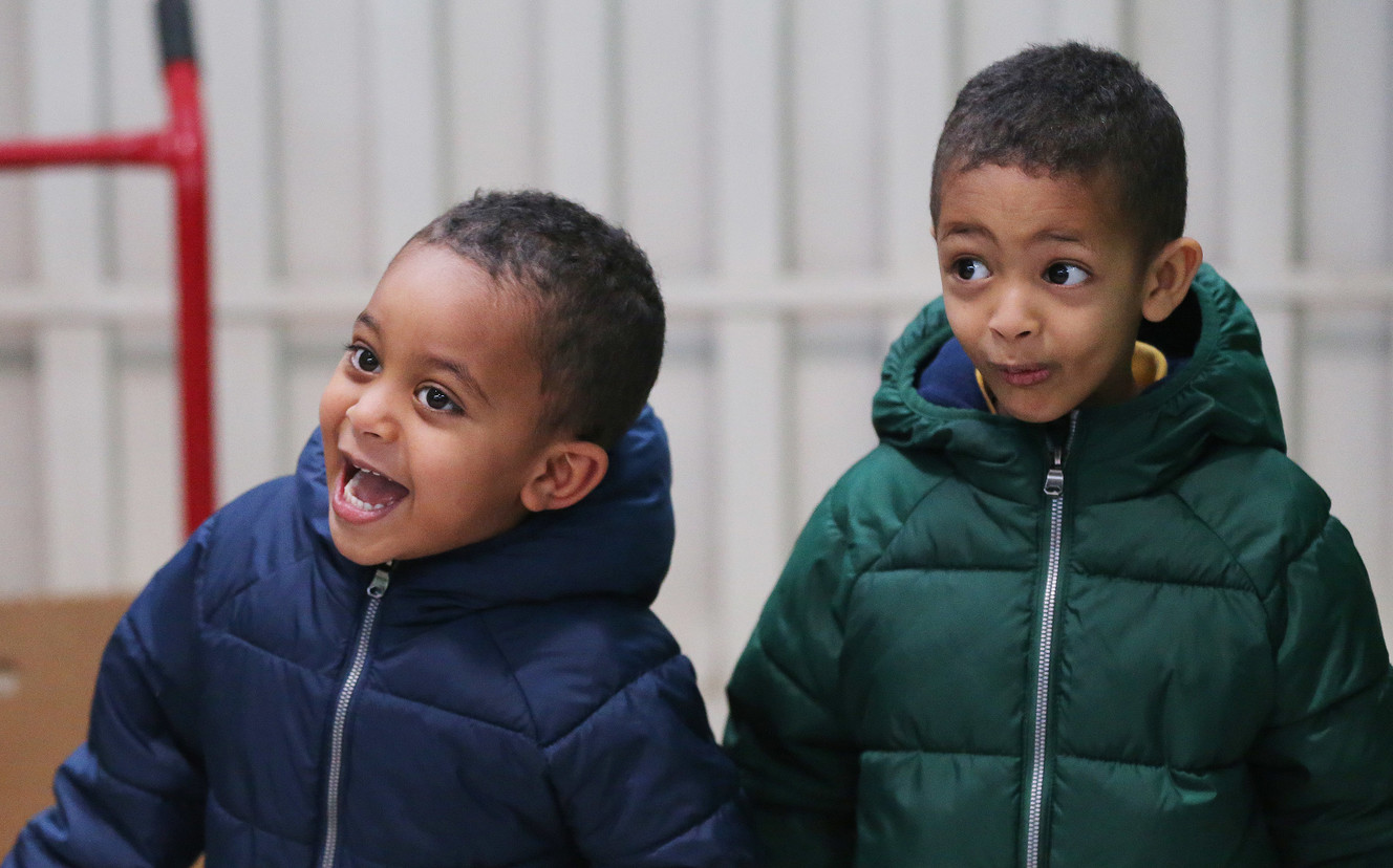 Unidentified children smile as they pick up gifts during the Salvation Army’s Angel Tree program in Salt Lake City on Friday, Dec. 21, 2018. Through the ongoing partnership between the Salt Lake Education Foundation and The Salvation Army, 1,469 school students, under the age of 13, received gifts and clothing. (Photo: Jeffrey D. Allred, KSL)