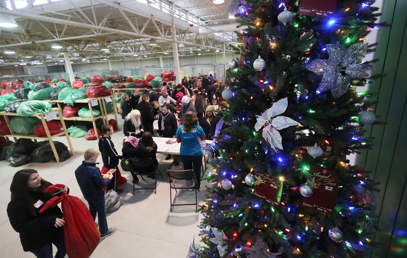 Volunteers hand out holiday gifts during the Salvation Army’s Angel Tree program in Salt Lake City on Friday, Dec. 21, 2018. Through the ongoing partnership between the Salt Lake Education Foundation and The Salvation Army, 1,469 school students, under the age of 13, received gifts and clothing. (Photo: Jeffrey D. Allred, KSL)
