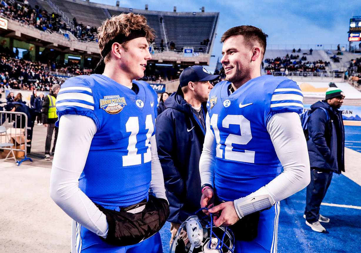 BYU quarterbacks Zach Wilson and Tanner Mangum as BYU defeats Western Michigan 49-18 at Albertsons Stadium in Boise, Idaho Friday, December 21, 2018. (Photo: Jaren Wilkey, BYU Photo)