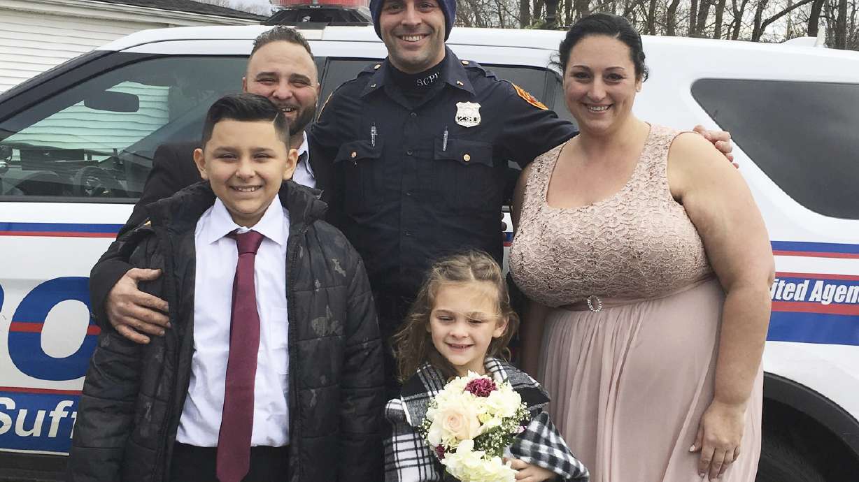 New York police officer saves wedding day after car crash