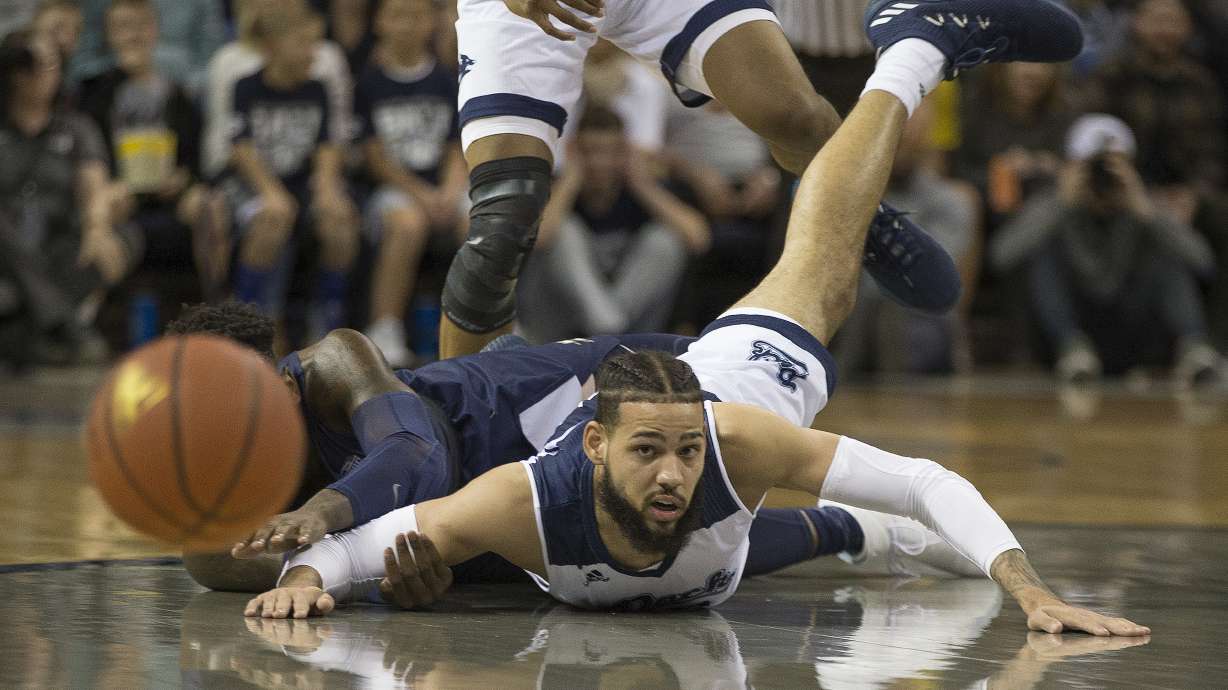 Martin scores 19, hits late 3 as No. 6 Nevada beats Akron