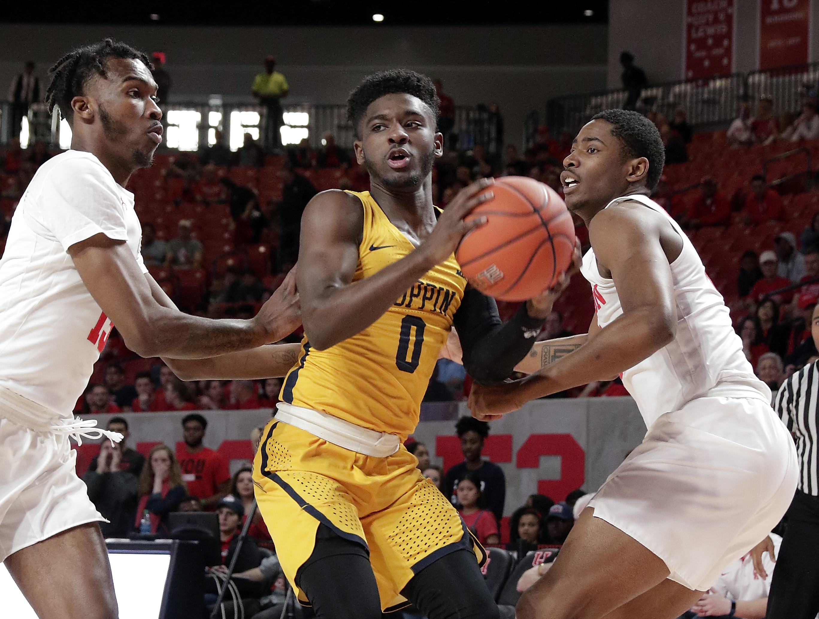 No. 21 Houston improves to 12-0, routing winless Coppin St
