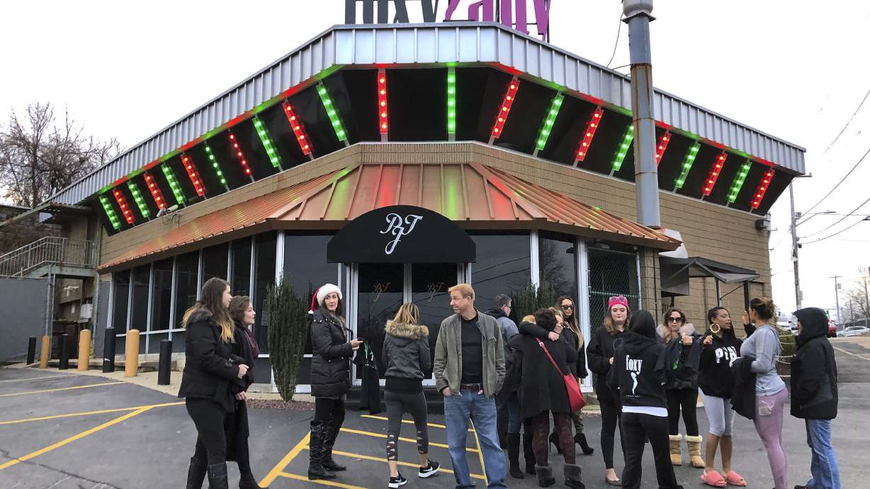 Owners of closed strip club buy toys for employees' children
