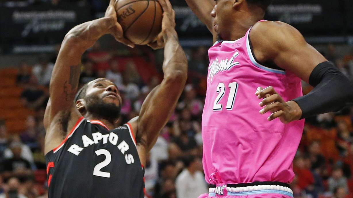 Raptors top Heat 106-104, improve NBA's best record
