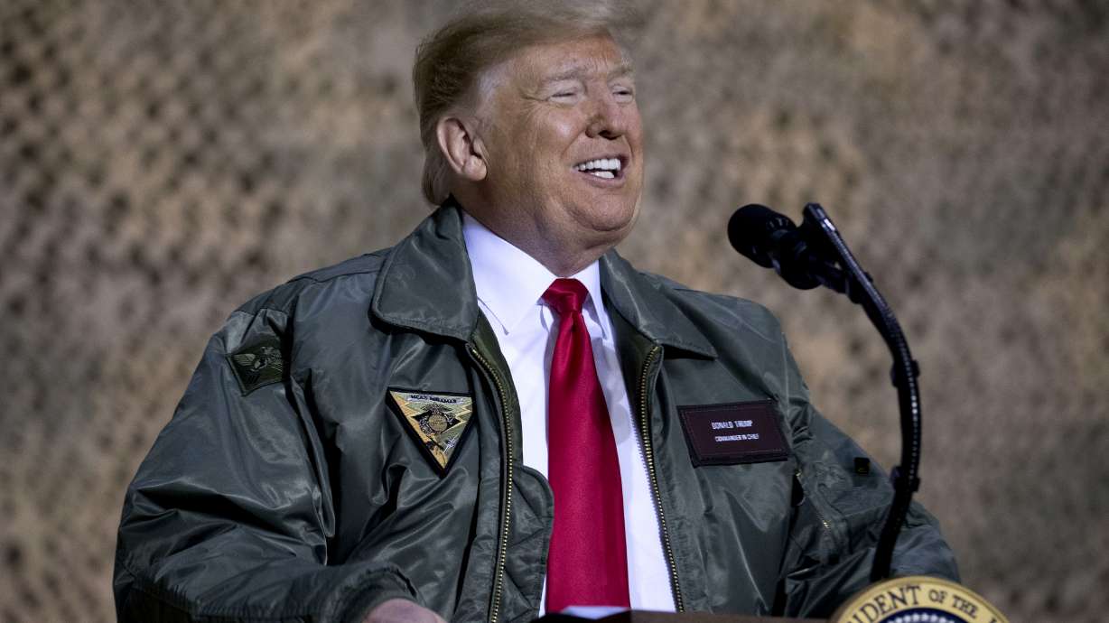 The Latest: Trump returns to US from surprise trip to Iraq