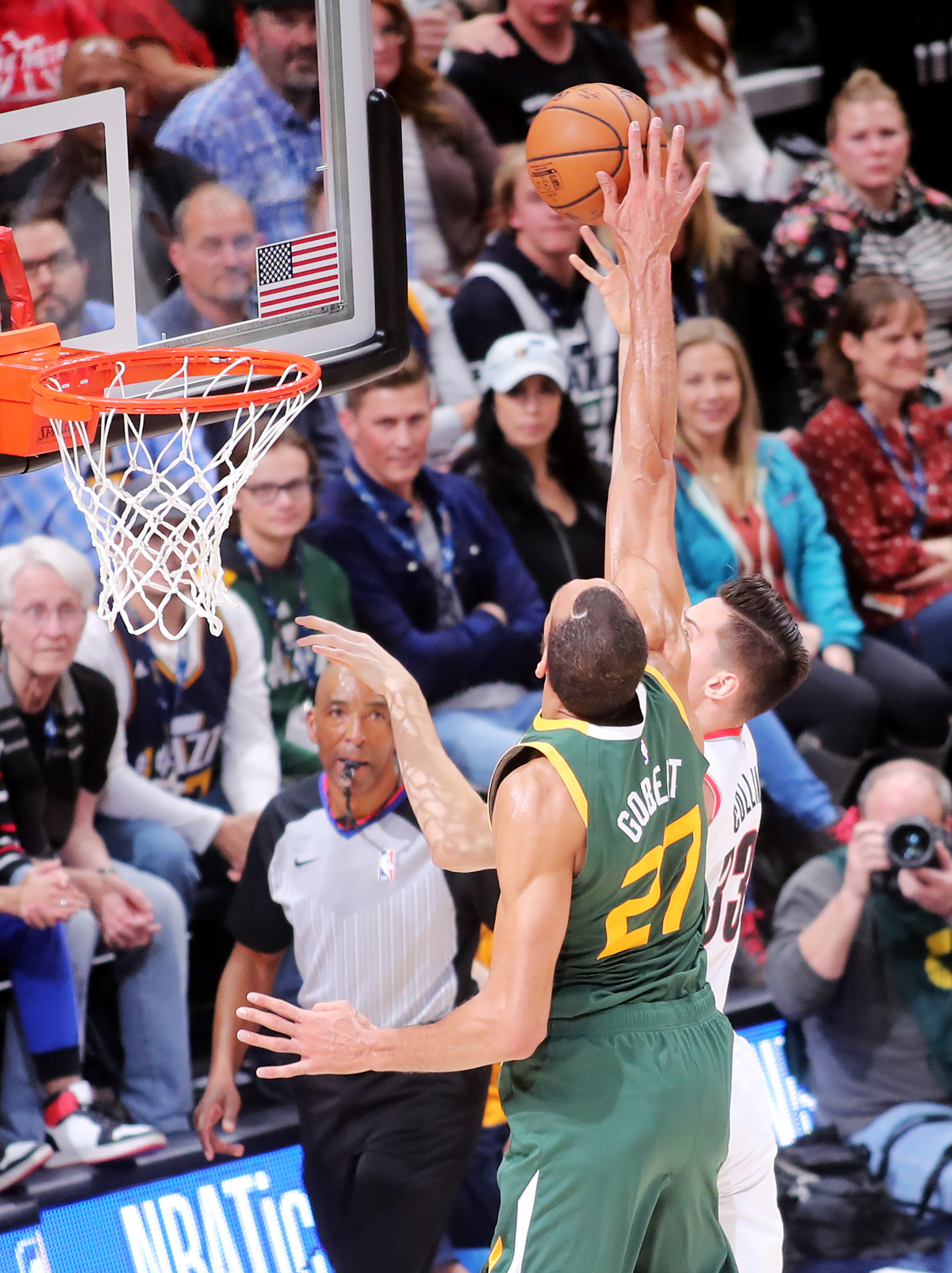 Utah Jazz center Rudy Gobert (27) blocks a shot by Portland Trail Blazers forward Zach Collins (33) as the Utah Jazz and the Portland Trail Blazers play an NBA basketball game at Vivint Smart Home Arena in Salt Lake City on Tuesday, Dec. 25, 2018.