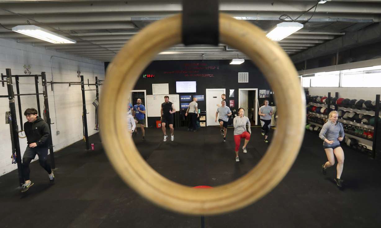 Clients warm up during a CrossFit class at Ute CrossFit Sugarhouse in Salt Lake City on Friday, Dec. 28, 2018. (Photo: Steve Griffin, KSL)