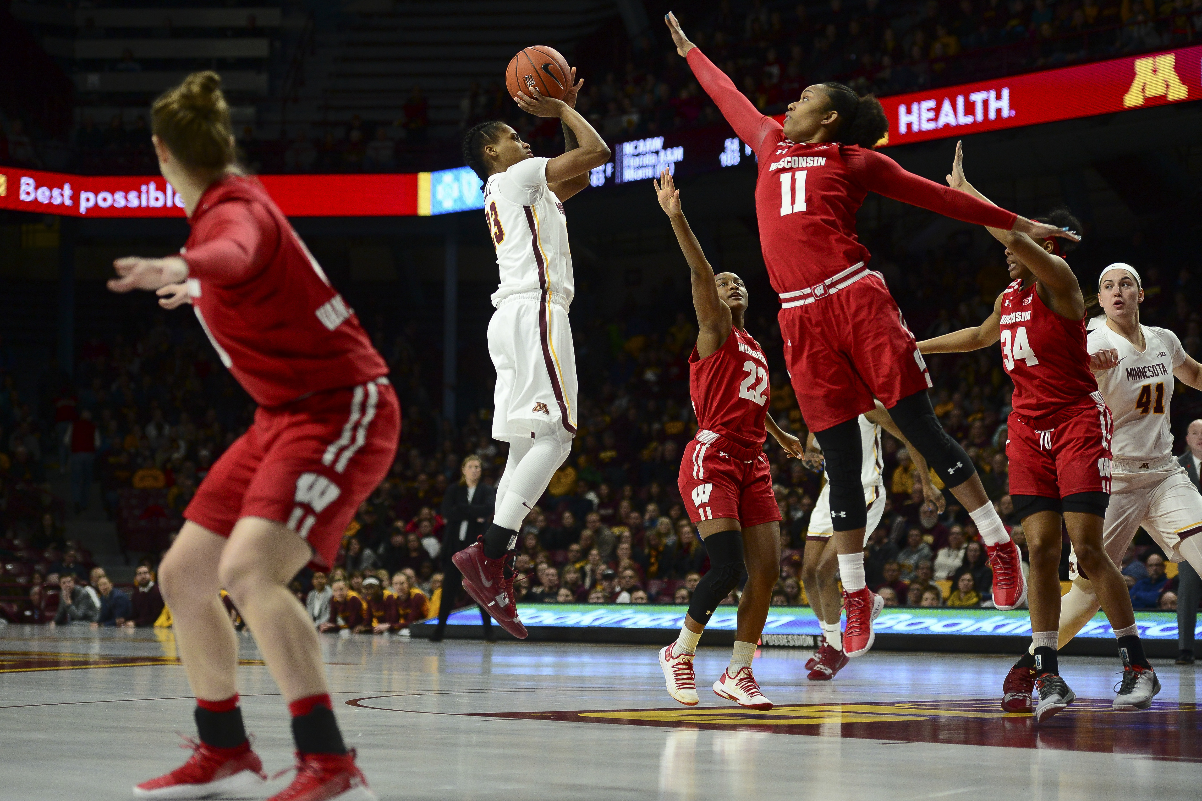 Lamke's 20 helps No. 12 Minnesota top Wisconsin 74-56