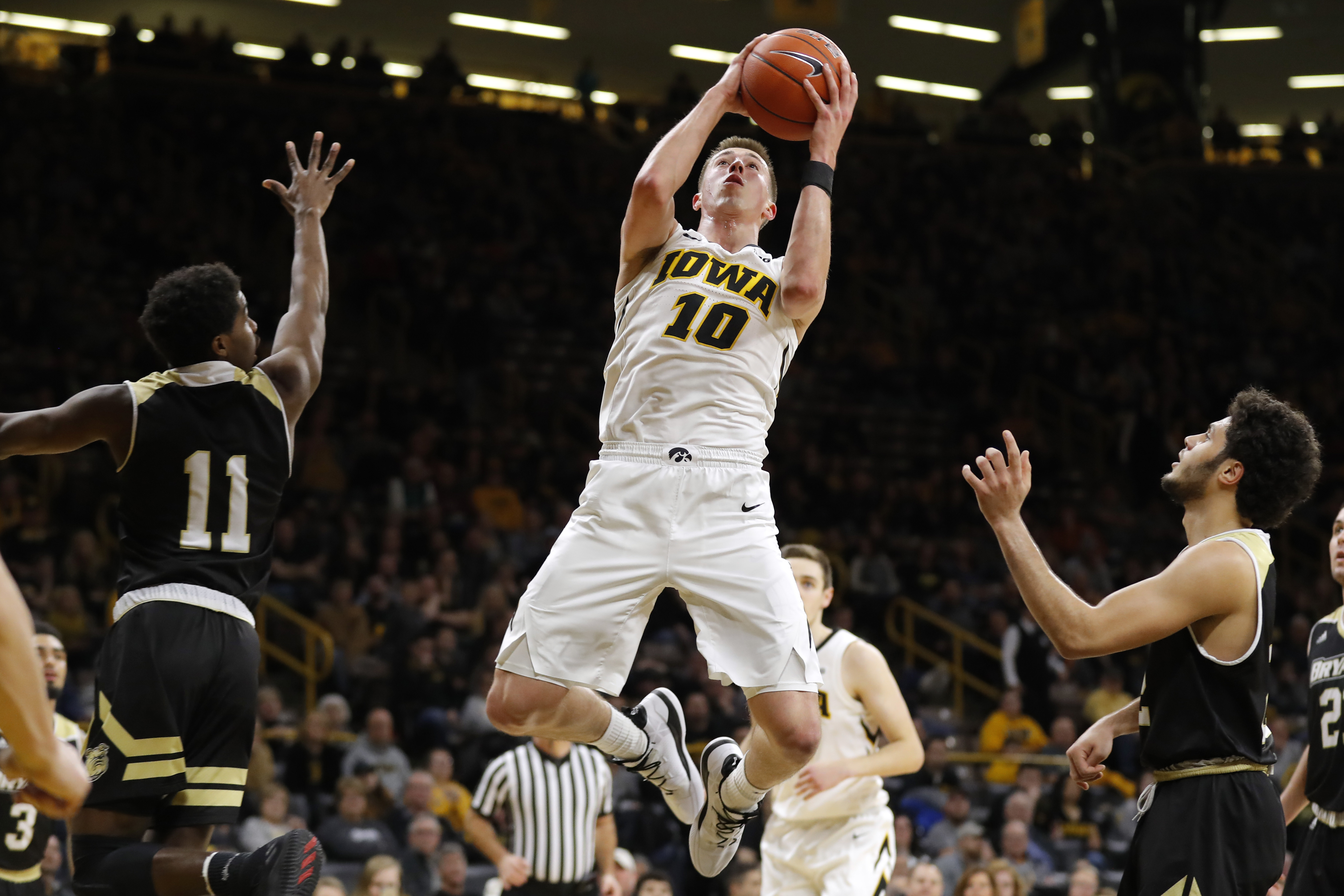 No. 24 Iowa survives lowly Bryant 72-67