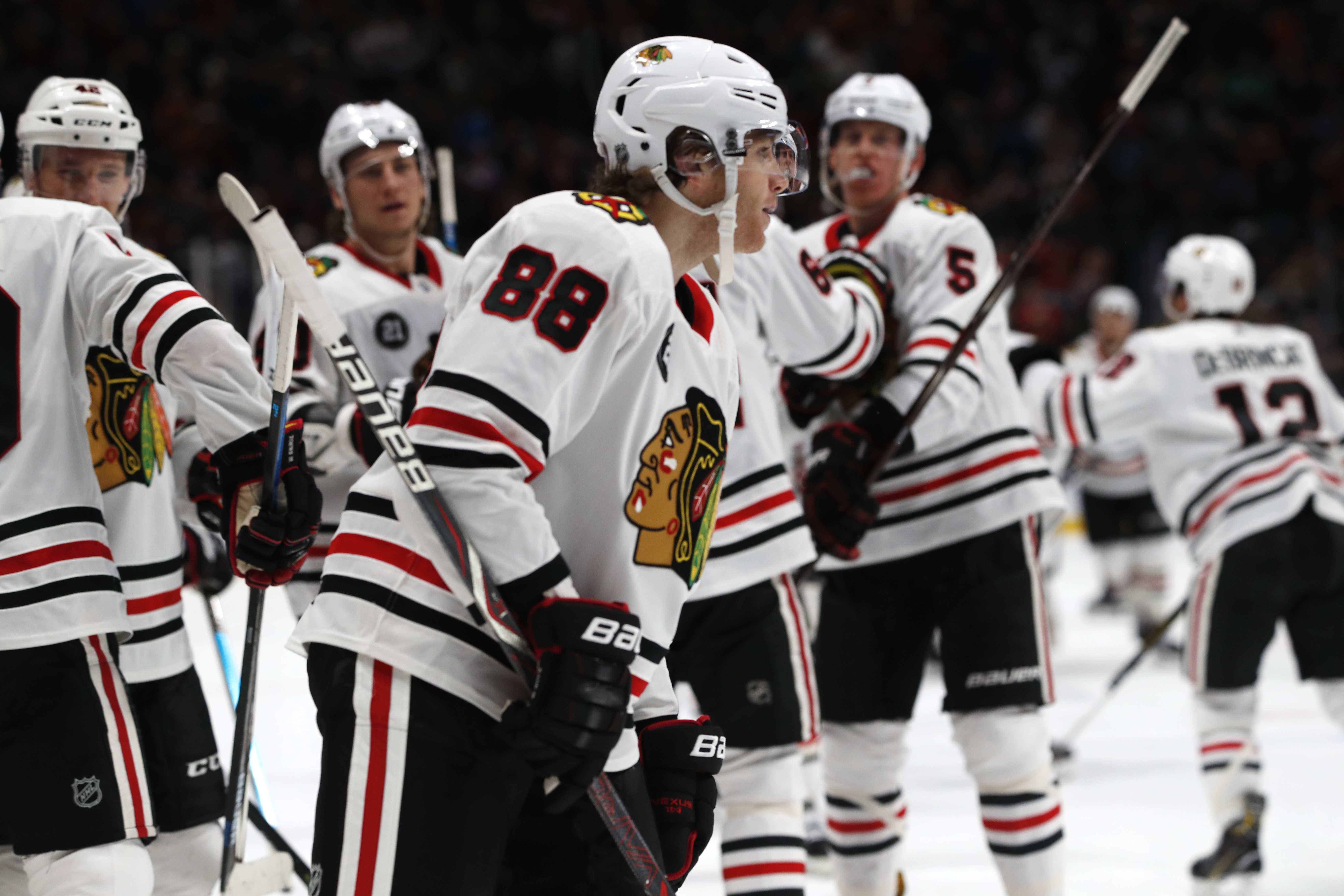 Kane scores 2nd of game in OT to lift Blackhawks over Avs