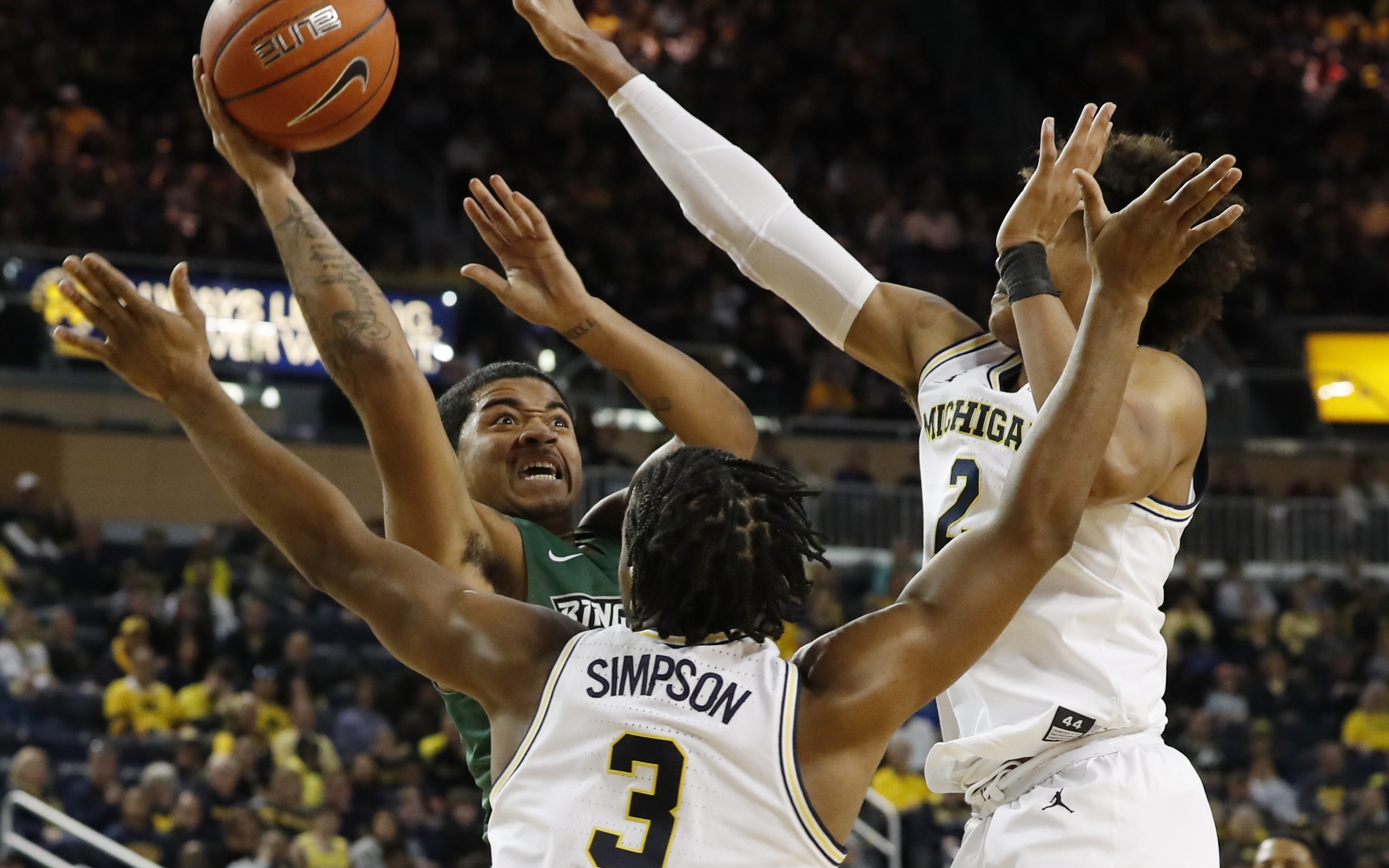 No. 2 Michigan pulls away for 74-52 win over Binghamton