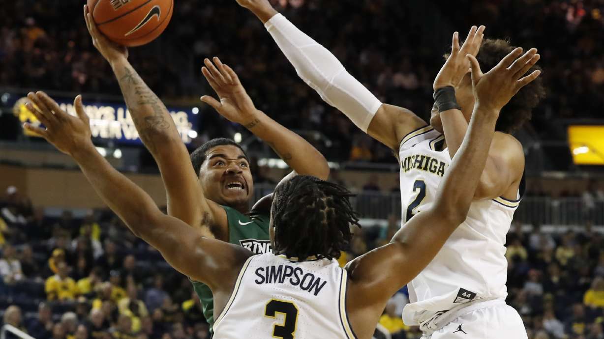 No. 2 Michigan pulls away for 74-52 win over Binghamton